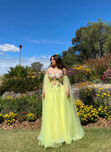 Load image into Gallery viewer, Mia yellow floral dress (with pockets and removable straps) without sleeves .