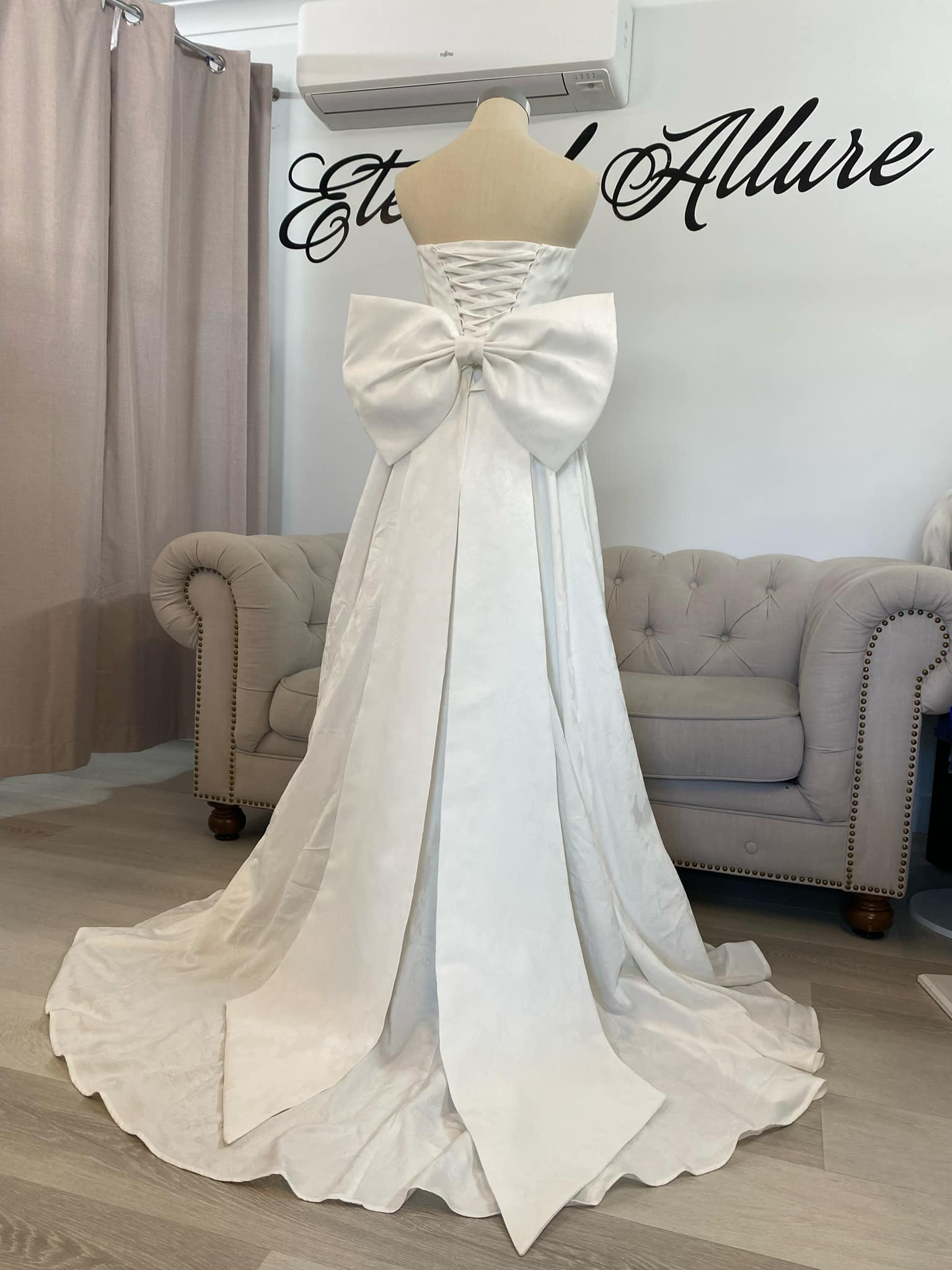 Emily wedding dress with big bow. Eternal Allure Pty Ltd Emily wedding dress with big bow. Eternal Allure Pty Ltd