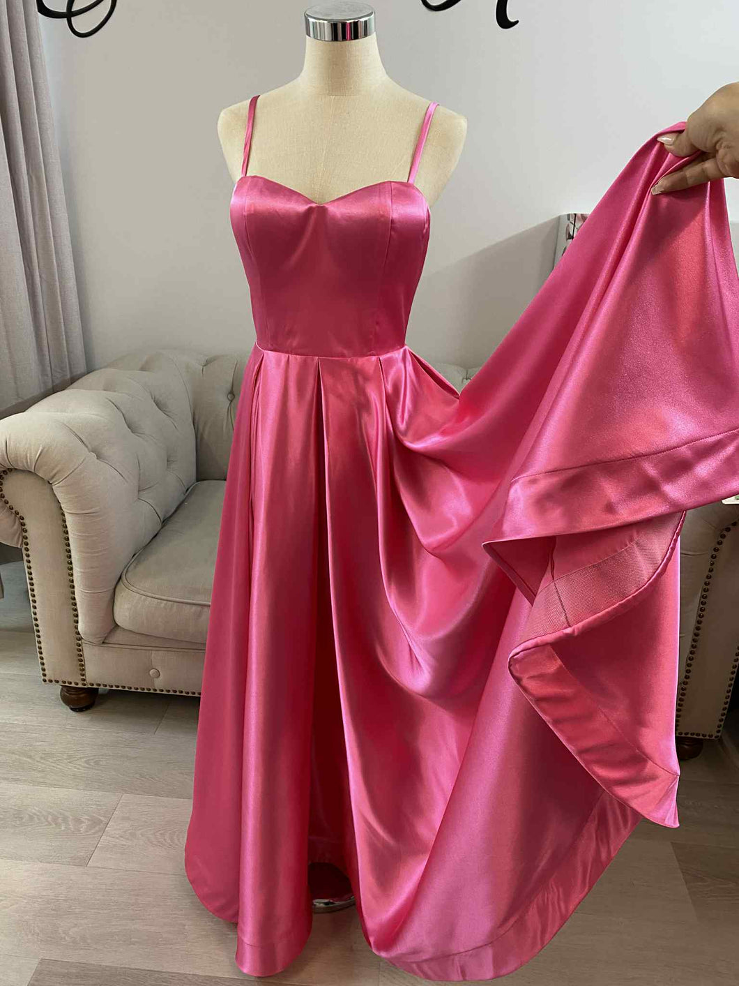 Emma hot pink formal dress with slit and pockets.