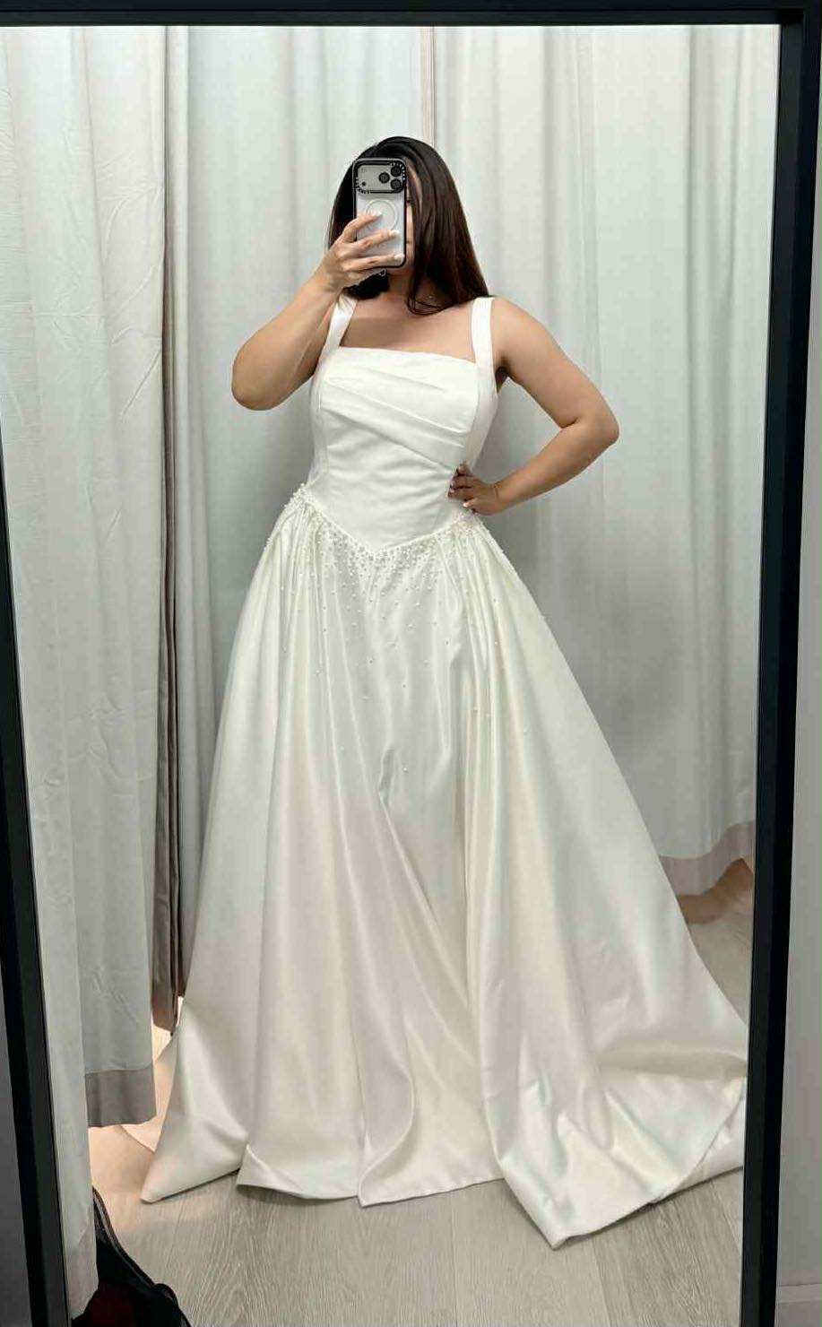 Amy wedding dress long train , with hand beaded pearls .