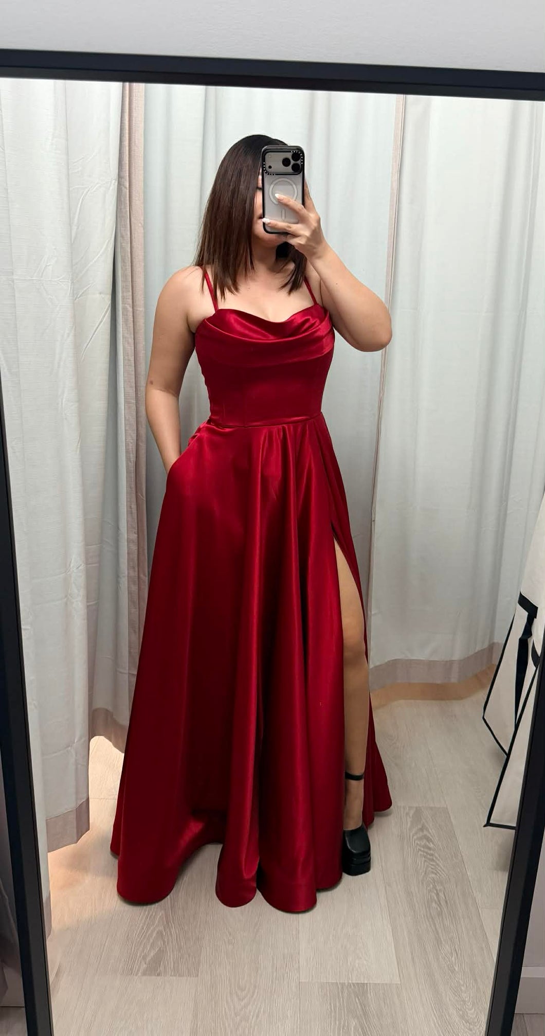 Emily red formal dress with slit and pockets .