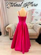Load image into Gallery viewer, Hayley Hot pink formal dress with slit and pockets , straps removable.
