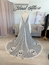 Load image into Gallery viewer, Hestia skull wedding dress with long sleeves and pockets.
