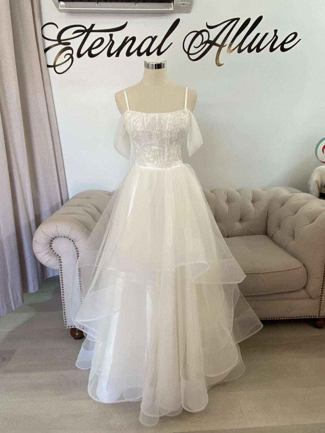 Jasmine waterfall wedding dress , deb dress (removable straps and off shoulders sleeves) with pockets.